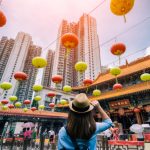 Young,Woman,Traveler,Is,Visiting,At,Wong,Tai,Sin,Temple
