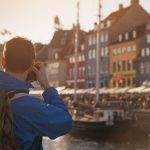 Tourist,In,Copenhagen,,Visit,Denmark,,Man,Taking,Photo,Of,Nyhavn