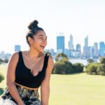 Young,Woman,Laughing/smiling,In,South,Perth,With,The,Perth,City