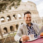 Young,Man,Sitting,And,Having,A,Cup,Of,Coffee,In