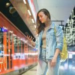 Teenager,Girl,In,Jeans,With,Backpack,Standing,On,Metro,Station
