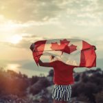 Happy,Child,Teenage,Girl,Waving,The,Flag,Of,Canada,While