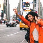 Woman,Looking,For,A,Taxi,In,New,York,City