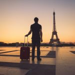 Tourist,In,Paris,Looking,At,Eiffel,Tower,,Silhouette,Of,Man