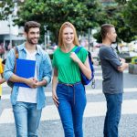 British,Female,Student,And,Brazilian,Guy,With,Group,Of,Mutliethnic