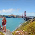 Friends,Looking,At,Beautiful,Summer,Coastal,Landscape,,On,Hiking,Trip.girls