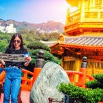 Young,Female,Tourist,With,Map,Looking,For,A,Way,To