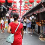 Woman,Tourist,Walking,In,Chinatown,On,China,Travel.,Asian,Girl