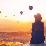 A,Woman,Alone,Unplugged,Sits,On,Top,Of,A,Mountain