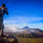 Trekker,Taking,Photo,Of,Gunung,Bromo,Volcano,In,Java,,Indonesia