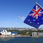 The,National,Flag,Of,Australia,Flies,Above,Sydney,Harbor,And
