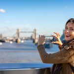 Pretty,Female,London,Tourist,Is,Taking,Pictures,Of,The,Tower