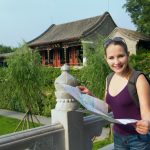 Caucasian,Woman,With,Map,And,Backpack,Travel,In,China.,Student